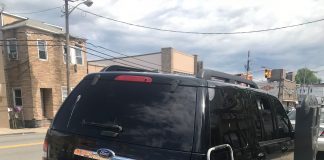 Police: Roque arrives in North Bergen after Newark SUV pulled over for hanging signs